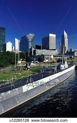 Stock Photo -  Cleveland, submarine, skyline, OH, Ohio, Downtown skyline of Cleveland, USS Cod Submarine Museum, Lake Erie. Fotosearch