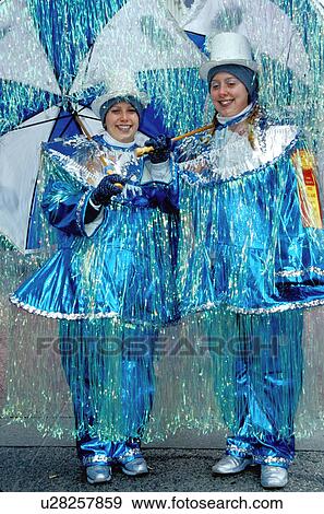 clown, costume, humor, Philadelphia, PA, Pennsylvania, Two women dressed in funny outfits with umbrellas pose for a picture in the Mummers Day Parade on New Years Day in Philadelphia. View Large Photo Image Stock Photo -  clown, costume, humor, Philadelphia, PA, Pennsylvania, Two women dressed in funny outfits with umbrellas pose for a picture in the Mummers Day Parade on New Years Day in Philadelphia.. Fotosearch