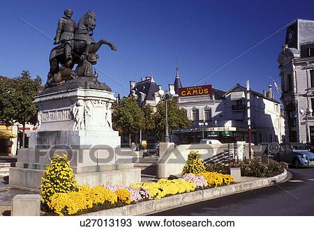 Stock Image -  Cognac, France, Poitou-Charentes, Charente, Europe, Statue of Francois I in the downtown of Cognac famous for the production of double-distilled spirits.. Fotosearch