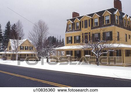 Stock Image -  college, university, winter, snow, Building on Middlebury College campus in winter in Bread Loaf in Addison County in the state of Vermont. . Fotosearch