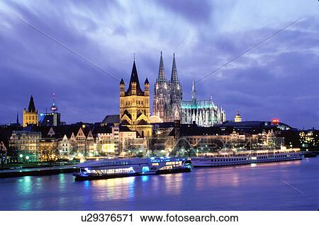 Cologne, Koln, Germany, Nordrhein-Westfalen, Rhine River, Europe, Scenic view at night of the city of Cologne (Koln) and the Cologne Cathedral (Dom) along the Rhine River. View Large Photo Image Stock Image - Cologne, Koln, Germany, Nordrhein-Westfalen, Rhine River, Europe, Scenic view at night of the city of Cologne (Koln) and the Cologne Cathedral (Dom) along the Rhine River.. Fotosearch
