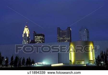 Stock Photo -  Columbus, COSI Columbus, skyline, OH, Ohio, Center of Science and Industry and the downtown skyline of Columbus in the evening.. Fotosearch