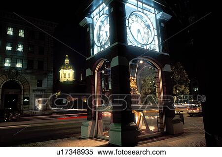 Concord, NH, New Hampshire, Large clock illuminated at night on Main Street in Concord. View Large Photo Image Stock Photography - Concord, NH, New Hampshire, Large clock illuminated at night on Main Street in Concord.. Fotosearch