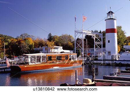 Stock Image -  Cooperstown, New York, NY, Classic Boat Tours on the waterfront of Otsego Lake in Cooperstown.. Fotosearch