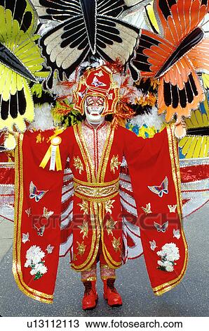 costume, parade, Philadelphia, PA, Pennsylvania, A man in the Fancy Division is dressed in a colorful red oriental costume with feathers in the Mummers Day Parade on New Years Day in Philadelphia. View Large Photo Image Stock Image - costume, parade, Philadelphia, PA, Pennsylvania, A man in the Fancy Division is dressed in a colorful red oriental costume with feathers in the Mummers Day Parade on New Years Day in Philadelphia.. Fotosearch