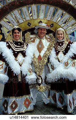 costume, parade, Philadelphia, PA, Pennsylvania, A man with a woman and girl pose for a picture dressed in costumes with feathers in the Fancy Division in the Mummers Day Parade on New Years Day in Philadelphia. View Large Photo Image Stock Image -  costume, parade, Philadelphia, PA, Pennsylvania, A man with a woman and girl pose for a picture dressed in costumes with feathers in the Fancy Division in the Mummers Day Parade on New Years Day in Philadelphia.. Fotosearch