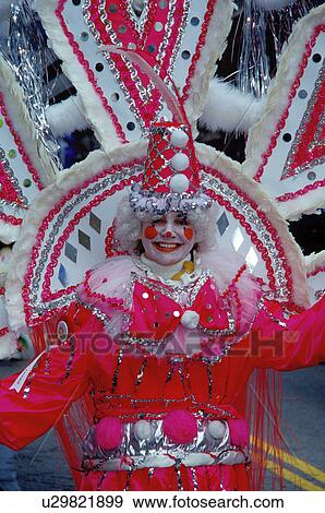 costume, parade, Philadelphia, PA, Pennsylvania, A woman in the Fancy Division is dressed in a pinkish-red clown costume in the Mummers Day Parade on New Years Day in Philadelphia. View Large Photo Image Stock Photo -  costume, parade, Philadelphia, PA, Pennsylvania, A woman in the Fancy Division is dressed in a pinkish-red clown costume in the Mummers Day Parade on New Years Day in Philadelphia.. Fotosearch