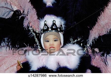 costume, Philadelphia, parade, PA, Pennsylvania, Young girl dressed in a costume of feathers in the Fancy Division in the Mummers Day Parade on New Years Day in Philadelphia. View Large Photo Image Stock Photograph - costume, Philadelphia, parade, PA, Pennsylvania, Young girl dressed in a costume of feathers in the Fancy Division in the Mummers Day Parade on New Years Day in Philadelphia.. Fotosearch