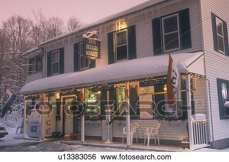 country market, country store, decorations, holiday, snow, winter, Twin Bridges Market is decorated for the Christmas holiday season in the evening in Bristol in Addison County in the state of Vermont. View Large Photo Image Stock Photograph - country market, country store, decorations, holiday, snow, winter, Twin Bridges Market is decorated for the Christmas holiday season in the evening in Bristol in Addison County in the state of Vermont. . Fotosearch