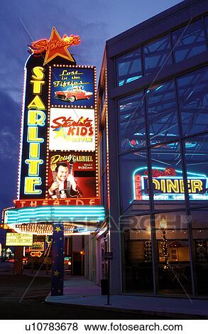 Stock Photo -  country music, Branson, MO, Missouri, Starlite Music Theater illuminated with neon lights at night along 76 Country Boulevard The Strip in Branson.. Fotosearch