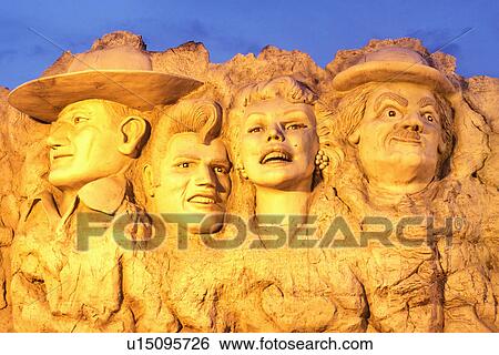 Country Music, Branson, MO, Missouri, Famous peoples faces displayed like Mount Rushmore at the Hollywood Wax Museum in Branson. View Large Photo Image Stock Photograph - Country Music, Branson, MO, Missouri, Famous peoples faces displayed like Mount Rushmore at the Hollywood Wax Museum in Branson.. Fotosearch