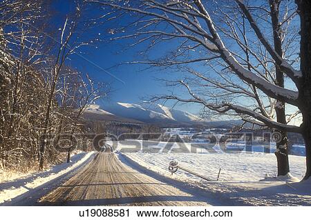 country road, scenic, mountain, winter scene, Mt. Mansfield, Scenic view of the snow covered countryside and Mount Mansfield along a country road on a sunny day in the winter in Pleasant Valley in Cambridge in Lamoille County in the state of Vermont. View Large Photo Image Stock Image - country road, scenic, mountain, winter scene, Mt. Mansfield, Scenic view of the snow covered countryside and Mount Mansfield along a country road on a sunny day in the winter in Pleasant Valley in Cambridge in Lamoille County in the state of Vermont. . Fotosearch