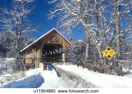 Stock Photography -  covered bridge, country road, winter, East Montpelier, Vermont, VT, Coburn Covered Bridge circa 1851 on a sunny day in East Montpelier in winter.. Fotosearch