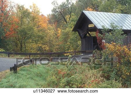 covered bridge, fall, Stowe, VT, Vermont, Emily or Stone Hollow or Gold Brook Covered Bridge surrounded by colorful fall foliage in autumn. View Large Photo Image Stock Photo - covered bridge, fall, Stowe, VT, Vermont, Emily or Stone Hollow or Gold Brook Covered Bridge surrounded by colorful fall foliage in autumn. . Fotosearch