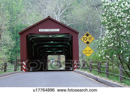 Stock Photograph -  covered bridge, Housatonic Valley, Lichtfield Hills, Connecticut, West Cornwall Covered Bridge in West Cornwall, Connecticut in the spring.. Fotosearch