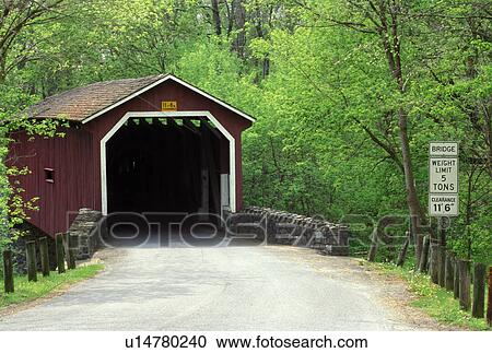 Stock Image -  covered bridge, Lancaster County, Pennsylvania Dutch Country, Lancaster, Amish Country, Pennsylvania, Covered bridge in Lancaster County Park in the spring.. Fotosearch