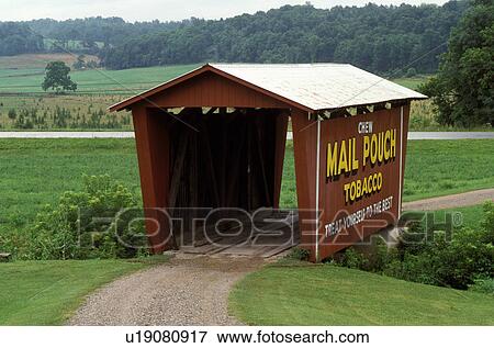 covered bridge, OH, Ohio, Covered Bridge with Chew Mail Pouch Tobacco painted on the side in Guernsey County in Southeastern Ohio. View Large Photo Image Stock Photo - covered bridge, OH, Ohio, Covered Bridge with Chew Mail Pouch Tobacco painted on the side in Guernsey County in Southeastern Ohio.. Fotosearch