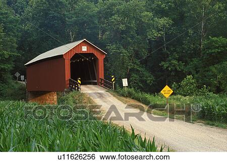 Stock Photograph -  covered bridge, OH, Ohio, Hune Covered Bridge on the Covered Bridge Scenic Byway in Southeastern Ohio.. Fotosearch