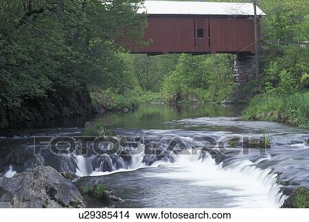 covered bridge, river, spring, Northfield Falls, VT, Vermont, Slaughter House Covered Bridge crosses over Dog River in the spring in Northfield Falls. View Large Photo Image Picture - covered bridge, river, spring, Northfield Falls, VT, Vermont, Slaughter House Covered Bridge crosses over Dog River in the spring in Northfield Falls.. Fotosearch