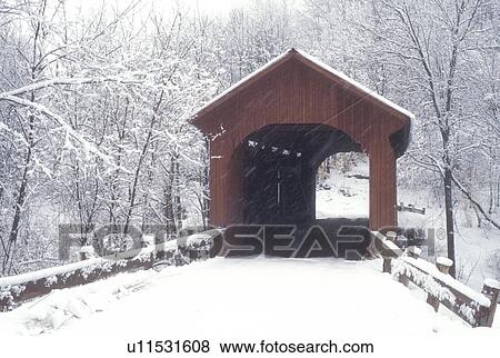 Stock Photo -  covered bridge, winter, Northfield Falls, Vermont, VT, Slaughter House Covered Bridge on a snowy day in Northfield Falls in winter.. Fotosearch