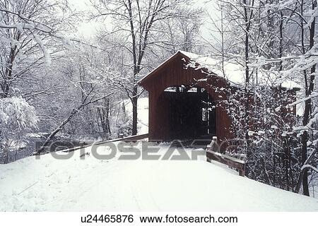 Stock Photograph -  covered bridge, winter, Northfield Falls, Vermont, VT, Slaughter House Covered Bridge on a snowy day in Northfield Falls in winter.. Fotosearch