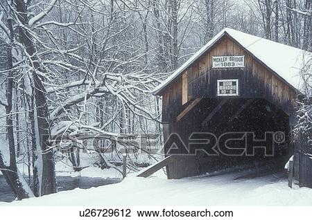 Stock Image -  covered bridge, winter, Vermont, VT, Moxley Covered Bridge ca. 1883 in the snow in winter in Chelsea.. Fotosearch