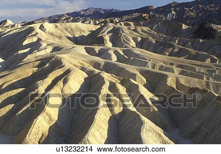 Death Valley, California, Mojave Desert, CA, View of the badlands from Zabriskie Point in Death Valley National Park. View Large Photo Image Picture - Death Valley, California, Mojave Desert, CA, View of the badlands from Zabriskie Point in Death Valley National Park.. Fotosearch