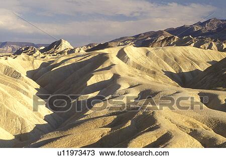 Stock Image -  Death Valley, California, Mojave Desert, CA, View of the badlands from Zabriskie Point in Death Valley National Park.. Fotosearch
