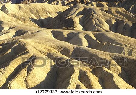 Death Valley, California, Mojave Desert, CA, View of the badlands from Zabriskie Point in Death Valley National Park. View Large Photo Image Stock Image - Death Valley, California, Mojave Desert, CA, View of the badlands from Zabriskie Point in Death Valley National Park.. Fotosearch