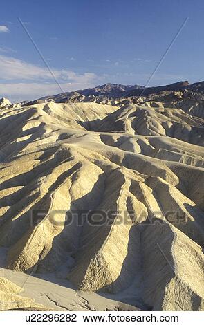 Death Valley, California, Mojave Desert, CA, View of the badlands from Zabriskie Point in Death Valley National Park. View Large Photo Image Stock Image - Death Valley, California, Mojave Desert, CA, View of the badlands from Zabriskie Point in Death Valley National Park.. Fotosearch