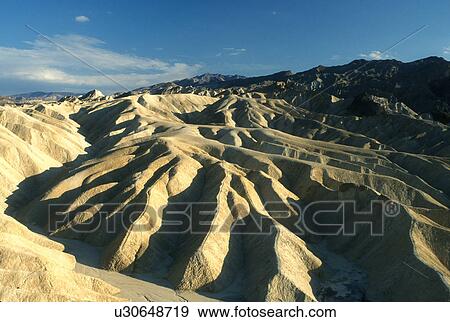 Stock Photo -  Death Valley, California, Mojave Desert, CA, View of the badlands from Zabriskie Point in Death Valley National Park.. Fotosearch
