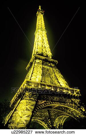 Stock Photo -  Eiffel Tower, Paris, France, Europe, The Eiffel Tower illuminated at night in Paris.. Fotosearch