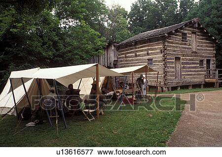 Stock Photo -  encampment, Abraham Lincoln, Petersburg, IL, Illinois, Interpreters at reenactment encampment at Lincoln's New Salem State Historic Site.. Fotosearch