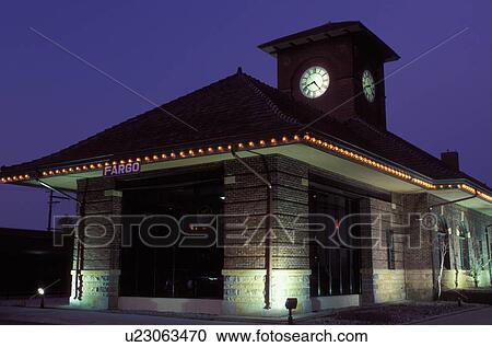 Stock Image -  Fargo, ND, North Dakota, Train Station at night in downtown Fargo.. Fotosearch