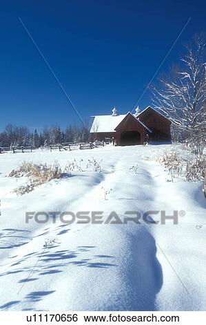 Stock Photograph -  farm, red barn, winter, Marshfield, Vermont, VT, Red barn on a farm in the snow on sunny day in winter in Marshfield.. Fotosearch
