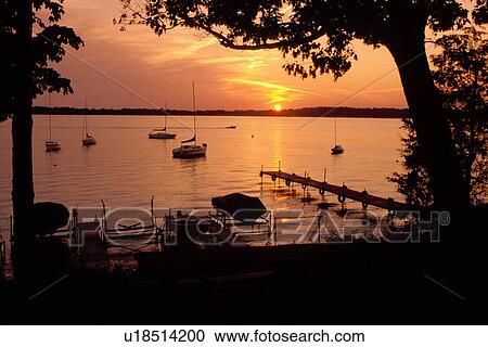 Finger lakes, sunset sunrise, Auburn, New York, NY, Owasco Yacht Club at sunset on Owasco Lake in Auburn. View Large Photo Image Stock Image - Finger lakes, sunset sunrise, Auburn, New York, NY, Owasco Yacht Club at sunset on Owasco Lake in Auburn.. Fotosearch