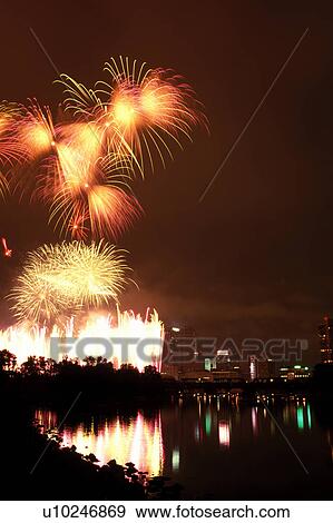 fireworks, Columbus, skyline, OH, Ohio, Firework display over the downtown skyline of Columbus on the Fourth of July along the Scioto River. View Large Photo Image Stock Photo - fireworks, Columbus, skyline, OH, Ohio, Firework display over the downtown skyline of Columbus on the Fourth of July along the Scioto River.. Fotosearch