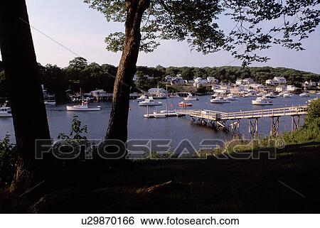 Stock Photograph -  fishing harbor, New Harbor, Pemaquid, Maine, ME, Scenic view of fishing boats in the harbor. . Fotosearch