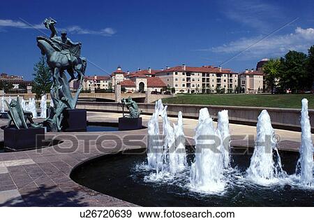 Stock Photo -  fountain, Kansas City, MO, Missouri, Statue and fountain on the riverwalk along Brush Creek.. Fotosearch