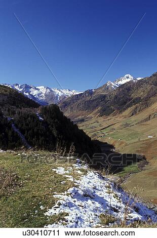 France, Col du Tourmalet, Midi-Pyrenees, The Pyrenees, Hautes-Pyrenees, Europe, Scenic view of the snow capped Pyrenees Mountains and the valley below of Col du Tourmalet. View Large Photo Image Stock Image - France, Col du Tourmalet, Midi-Pyrenees, The Pyrenees, Hautes-Pyrenees, Europe, Scenic view of the snow capped Pyrenees Mountains and the valley below of Col du Tourmalet.. Fotosearch