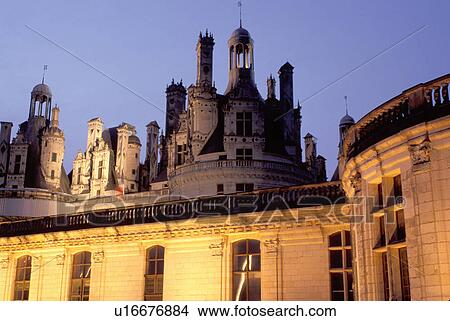Picture -  France, Loire Valley, chateau, Chambord, Loire Castle Region, Loir-et-Cher, Centre, Europe, The Renaissance Chateau of Chambord illuminated at night. Largest of all the castles in the Loire Valley.. Fotosearch