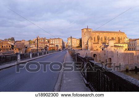 Stock Image -  France, Midi-Pyrenees, Gaillac, Tarn, Europe, Sunset over the village of Gaillac.. Fotosearch