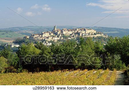 Stock Image -  France, Midi-Pyrenees, Cordes-sur-Ciel, the Dordogne, Quercy, Tarn, Europe, Scenic view of the medieval hilltop village of Cordes-sur-Ciel.. Fotosearch