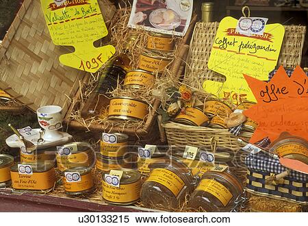 France, Perigord, Dordogne, Aquitaine, Europe, Sarlet-la-Caneda, A store front in the medieval village of Sarlet-la-Caneda displays foie gras (goose liver). View Large Photo Image Stock Photography - France, Perigord, Dordogne, Aquitaine, Europe, Sarlet-la-Caneda, A store front in the medieval village of Sarlet-la-Caneda displays foie gras (goose liver). . Fotosearch
