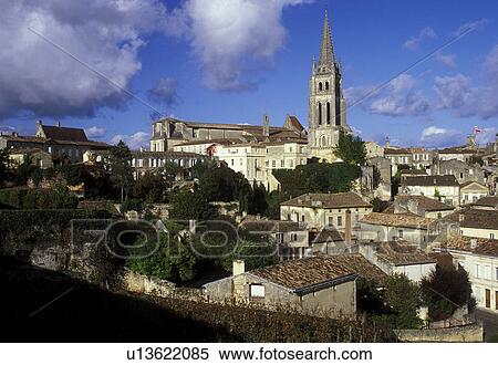 France, Saint Emilion, Bordeaux Wine Region, Gironde, Aquitaine, Europe, Eglise Monolithe rises above the medieval village of St. Emilion. View Large Photo Image Stock Photography - France, Saint Emilion, Bordeaux Wine Region, Gironde, Aquitaine, Europe, Eglise Monolithe rises above the medieval village of St. Emilion.. Fotosearch
