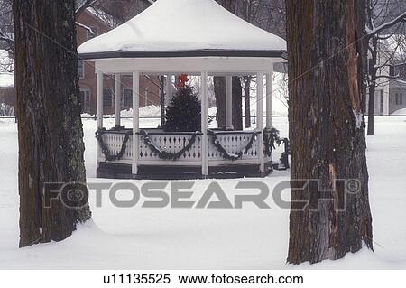 gazebo, Christmas tree, holiday, winter, snow, decorations, The gazebo on the Green is decorated with a Christmas tree for the holiday season on a snow covered day in the village of Weston in Windsor County in the state of Vermont. View Large Photo Image Stock Photography - gazebo, Christmas tree, holiday, winter, snow, decorations, The gazebo on the Green is decorated with a Christmas tree for the holiday season on a snow covered day in the village of Weston in Windsor County in the state of Vermont. . Fotosearch