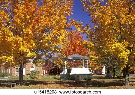 Stock Photo -  gazebo, Hancock, NH, New Hampshire, A gazebo surrounded by colorful maple trees in the town of Hancock in the autumn.. Fotosearch