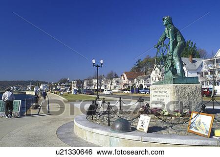 Stock Photograph -  Gloucester, MA, Massachusetts, Fisherman's Monument along Stacy Boulevard in Gloucester in the fall.. Fotosearch