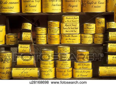 Stock Photo -  goose liver, foie gras, can, France, Perigord, Dordogne, Aquitaine, Europe, Sarlet-la-Caneda, Cans of foie gras (goose liver) are displayed on a shelf in a store in the medieval village of Sarlet-la-Caneda. . Fotosearch