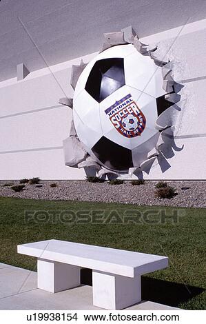 Picture -  hall of fame, soccer, Oneonta, New York, NY, Large soccer ball in the wall at the National Soccer Hall of Fame. Fotosearch